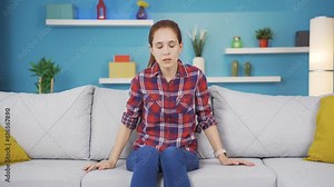Sick young woman with rapid breathing. The young woman cannot control her breathing.