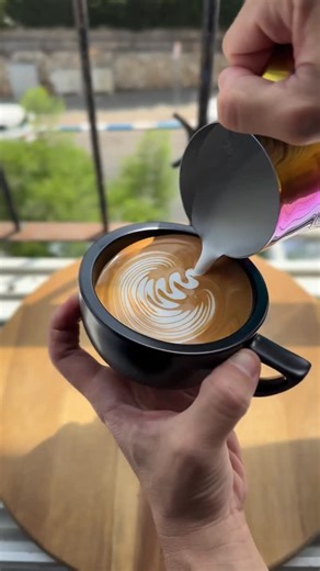 Asaf Rauch - Barista Swag Latte Art on Instagram: "Pouring a rosetta is about letting the flow create the separation.⁠ ⁠ Start relatively early, wiggle in place, and let the flow carry the lines away from each other instead of forcing them.⁠ Once the base is established, pull back, lift, and cut through.⁠ ⁠ Control the flow and the pattern takes care of itself.⁠ ⁠ Pitcher used: EVO.⁠ ⁠ #latteart⁠ #barista⁠ #specialtycoffee"