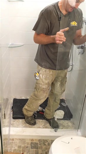 2.1K views | Glass door installation can be a nerve racking job  Be delicate with setting glass down on a hard surface #DIY #glass #homeimprovement #bathroomdesign #bathroomremodel #bath | Bathroom Remodelingteacher | Facebook