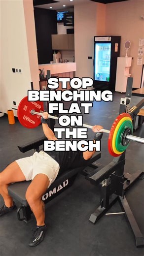 Matthew Henry on Instagram: "Some people bench flat on the bench because it feels simple. But simple is not strong. If your shoulders keep rolling forward, or the bar keeps getting stuck halfway up. It usually comes back to the same thing You’re lying flat, your scapulas have nowhere to travel And you end up losing all the tension you built before the rep even starts. When you set up properly on the bench, you get right on top of your shoulders, tuck the chin, lock your upper back in place coach
