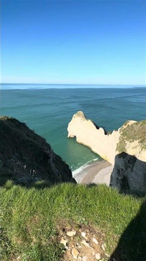Discover the stunning cliffs of Étretat in Normandy, France.