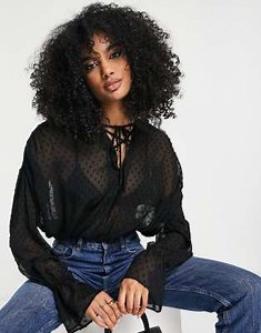 ASOS DESIGN textured blouse with volume long sleeve with tie front in black   | ASOS