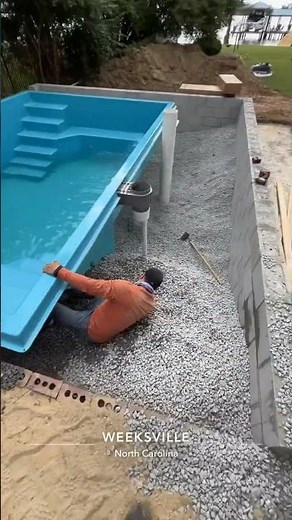 Filling up 12x18 Genesis Fiberglass pool with water as we backfill gravel #fiberglass #genesis #pool
