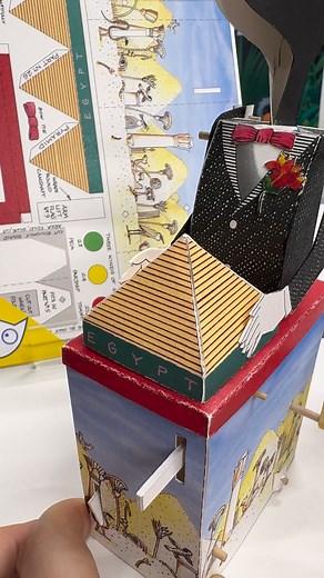 Magic Soup completed! This paper Anubis model, designed by Paul Spooner, is our most difficult automata kit but it's so satisfying once you get it working...! Originally published 27 years ago & bought back this year to celebrate 40 years since Cabaret Mechanical Theatre opened in Covent Garden. https://cabaret.co.uk/product/magic-soup-anubis-automata-kit/ | Cabaret Mechanical Theatre