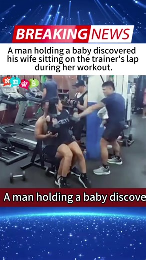 A man holding a baby discovered his wife sitting on the trainer's lap during her workout.#breakingnews #gym #coach #surveillance #fypppppppppp