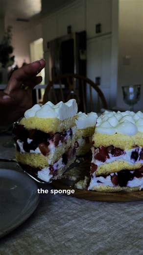 Porto’s Milk’N Berries® Cake is a hit at every celebration! Sponge cake heavily-soaked with Rosa's original Tres Leches, layered with whipped cream and a blend of blueberry, strawberry, and blackberry. | Porto's Bakery