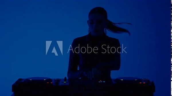 Pretty Young Lady Dancing And Mixing Tracks By Modern DJ Controller In Nightclub Or Music Studio