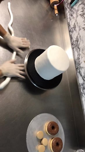 Decorating a Cake with Donuts and Icing Techniques