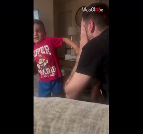 Dad gets a surprise slap from his toddler during playful game