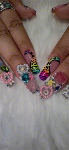 The perfect mashup of wild whimsical: neon animal print claws colliding with sugar-coated candy jewels. It’s giving grown-up Lisa Frank vibes 🌈 Let’s create YOUR statement set. Book with Thu today!→ https://Nailsdazzlebythu.as.me/ #nailsdazzlebythu #nailed #3dnails #nailsokc #nailsofokc #nailtechsofokc | Diamond Nails Studio