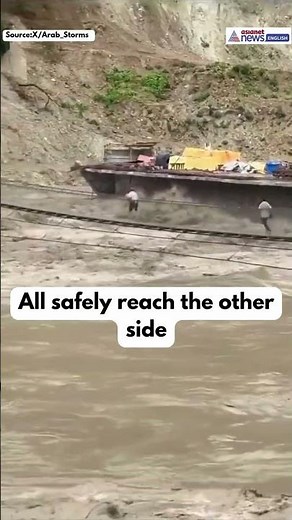 Nepal Floods #shorts: Terrifying Bridge Crossing Amid Raging Waters