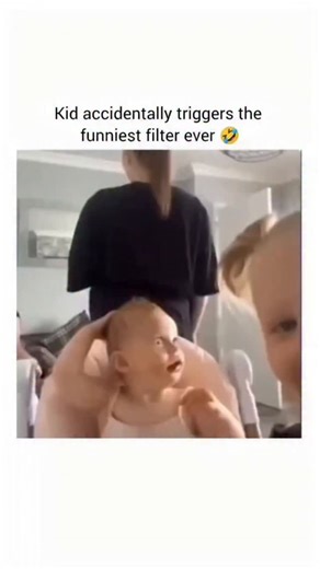 explain.ia on Instagram: "This video is a humorous clip featuring a facial recognition or "face-swap" filter. Here is a summary of the action: Setup: The text on the screen says, "Kid accidentally triggers the funniest filter ever." The Filter: The video begins with a close-up of a young child (a baby) who is being held by an adult. Suddenly, a very exaggerated and distorted facial filter is applied to the child's face. The filter makes the baby's eyes wide and bulging and stretches their mouth 