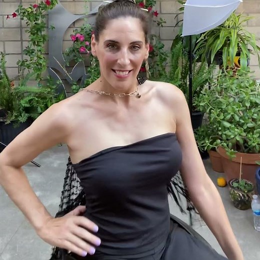 Beautiful Clipondra ability wheelchair fashion model twirling.