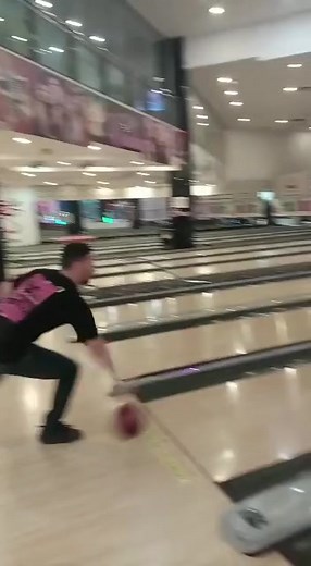 Bowling Fun: Watch the Perfect Roll in Action