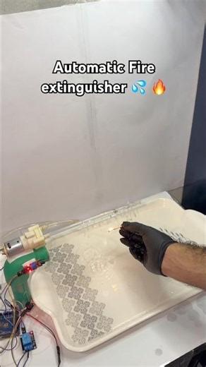 🚨 Automatic Fire Extinguisher System with Arduino 🔥🤖 #diyelectronics #arduinoproject #esp32