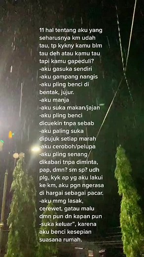 Captivating Night Rainfall with Streetlight Glow