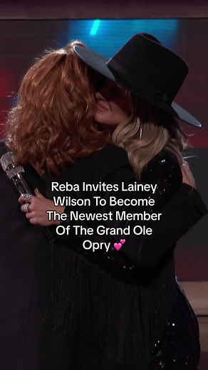 @Reba McEntire has invited @Lainey Wilson to become the newest member of Grand Ole Opry! During @NBC's The Voice season finale – Reba surprised Lainey with the special invite. Lainey is scheduled to be inducted into the Opry on June 7th. Get your tickets at the link in our bio! #Opry #GrandOleOpry #OpryTok #TheVoice #LaineyWilson