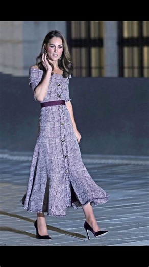 A Look at Her Evening Gowns Video Content: A captivating slow-motion shot of her walking down a red carpet in one of her iconic, glamorous evening gowns. The video should capture the details of the fabric and the silhouette. Caption: A vision of glamour. Princess Catherine's evening gowns are the epitome of royal elegance. She commands attention and radiates sophistication in every detail, from the intricate fabrics to the stunning silhouettes. #EveningGowns #RoyalGlamour #RedCarpetStyle #KateMi