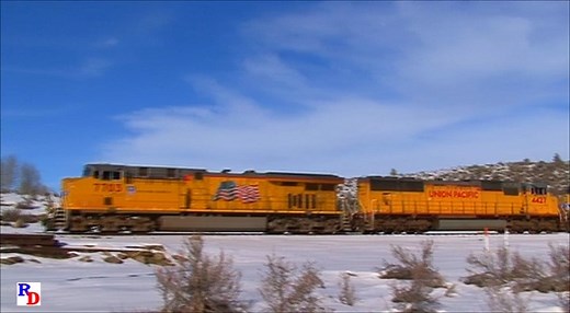 Two Union Pacific doublestack trains and an autorack train on Donner Pass. From the Pentrex show "Doublestacks over Donner" https://rfd.video/DoubleDonner | Railfan Depot