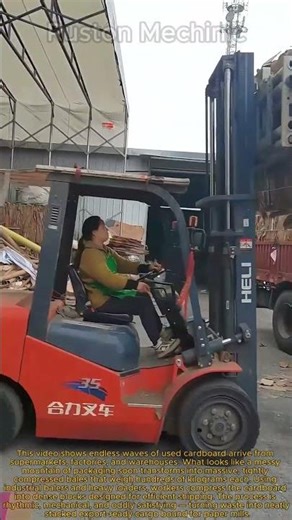 The Power of Compression: How Massive Cardboard Bales are Loaded for Export