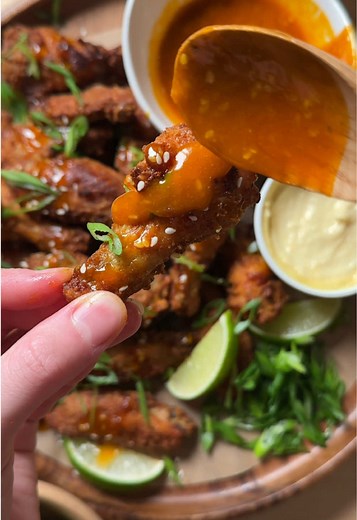 Crispy Baked Chicken Wings with Honey Sesame Sriracha Sauce