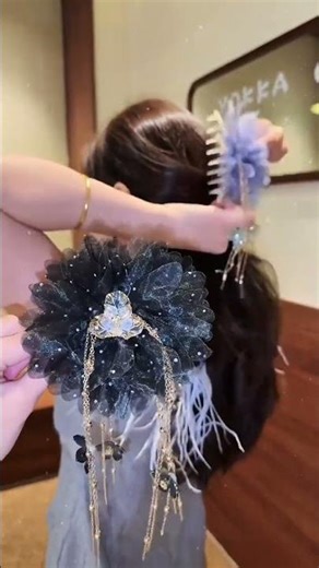 Watch Women Unveil Spring's Beauty with Flower Clippers