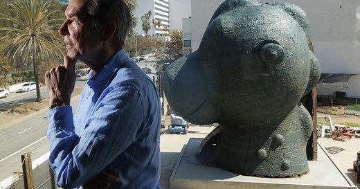 Artist Jeff Koons plants first succulent on his “Split-Rocker” sculpture at LACMA