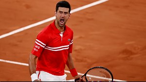 French Open: Novak Djokovic fights off Matteo Berrettini to set up Rafael Nadal semi-final