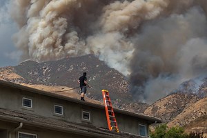 Line and Davis fires grow in California and Nevada, displacing thousands