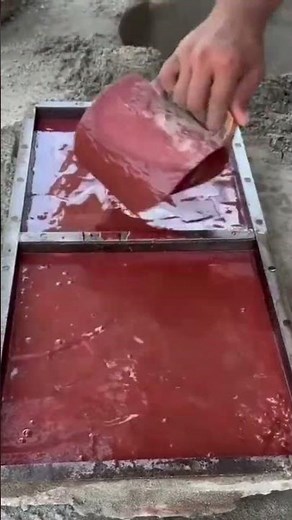 pouring special dyes and paints into the mold to form the specified shape