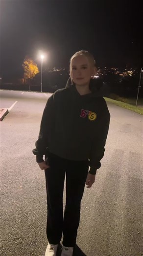 Comparing Audi and BMW Sedans at Night