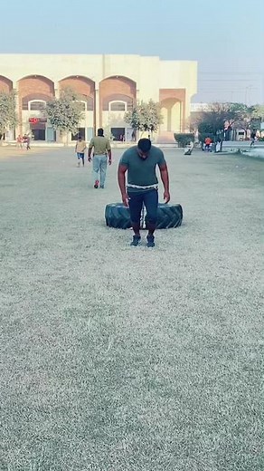 Outdoor Fitness Training with Heavy Rope Exercises