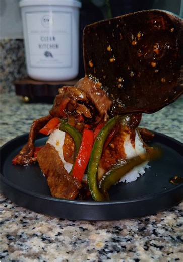 For the love of pepper steak. Recipe 👇🏾 Steak marinade 🛒Ingredients: * 1 lb top sirloin, pat dry & slice * Salt pepper * Garlic power * Onion powder * Beef or chicken bouillon * 2 garlic cloves, minced * Ginger paste * Dark soy sauce * Dark brown sugar * Baking soda * Rice vinegar * Marinade steak for 30 mins ✨Tip: Add red peppers flakes for a kick 🧑‍🍳Cook: * Slice onions & bell peppers, set aside * Heat pan on med-high with avocado oil. * Sear 1-2 mins per side until glazed golden brown (d