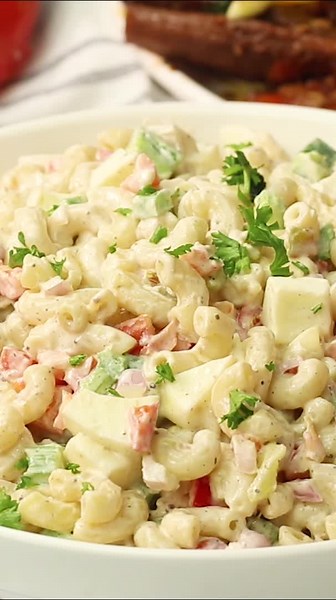 Macaroni Salad Recipe – A real classic, this macaroni salad made with just a few simple ingredients delivers big-time flavor. It's an easy, comforting side dish for fried chicken, barbecue, and other picnic meals! 🧺 Recipe link: https://www.africanbites.com/macaroni-salad/ #newontheblog #macaronisalad #macaronisaladrecipe #macaronisalad | Immaculatebites