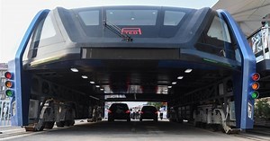 Watch: China unveils elevated bus to beat the traffic