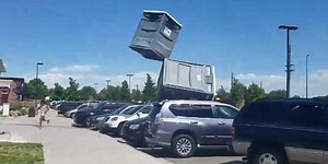 Watch these porta-potties take flight in horrifying video