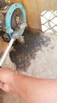 How does a manual bilge pump operate and when should it be used?