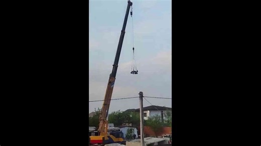 Crane operator lifts drunk man on pallet swing in Solovei-Kliuch, Primorye, Russia