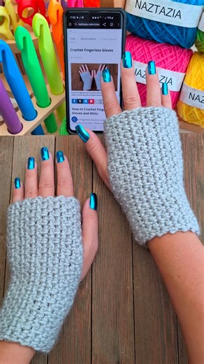 Naztazia on Instagram: "Crochet fingerless gloves, in this tutorial from Naztazia, are useful to keep the hands warm, yet still be able to do things like type. They are easy to make from a folded square and one seam. #crochet #knitting #artist #yarn #gloves #tutorial #makersgonnamake #crocheting #grannysquares #naztazia #reels"