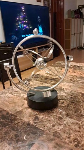 sarah on Instagram: "Perpetual Motion Pendulum" or "celestial orbit display". A gadget that demonstrates kinetic energy and principles of perpetual motion. These typically use hidden magnets and a power source to keep the metallic balls swinging in an orbital pattern. This model is similar in Bohr atomic model, proposed by Niels Bohr in 1913, Danish Physicist who made foundational contributions to the understanding of atomic structure and quantum mechanics. #post #highlightsシ゚ #everyoneシ゚"