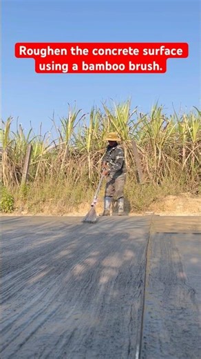 Roughen the concrete surface using a bamboo brush. #useful #works #shortvideo #farming #construction