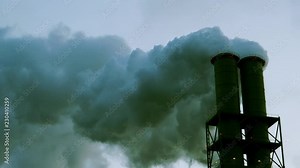 Chimney smoking stack. Air pollution and climate change. Smoking pipes