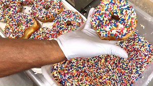Just let it sink into the sprinkles... | Paul's Bakery