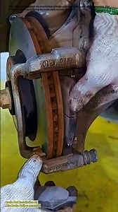 Brake Pad Installation on Disc Brake Caliper Assembly
