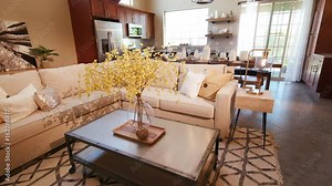 Wide Main Living Room Rising to Show Open Room Layout. shot rises from the lower floor to reveal the main open loft style living room and kitchen open layout Stock Video