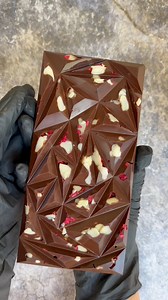 Seriously delicious! Our handmade chocolate, packed with crunchy nuts and juicy freeze-dried berries, is a must-try. Get yours today! 👇#ChocolateArtisan #BerriesAndNuts #HandmadeSweets #TreatYourself #ShopLocal (if applicable) #YummyChocolate | The Unique Chocolate