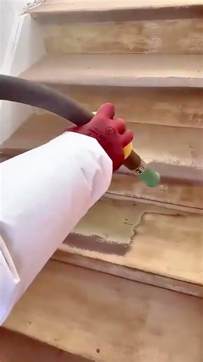 Removing Old Paint from Wooden Stairs with a High Pressure Sandblasting Cleaning Tool