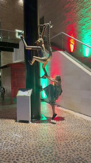 Woman Hangs on Statue and Topples the Whole Thing