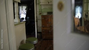 Federal style home front door swinging open.