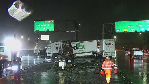 LA freeway crash sends FedEx packages flying as storm hits just before Christmas